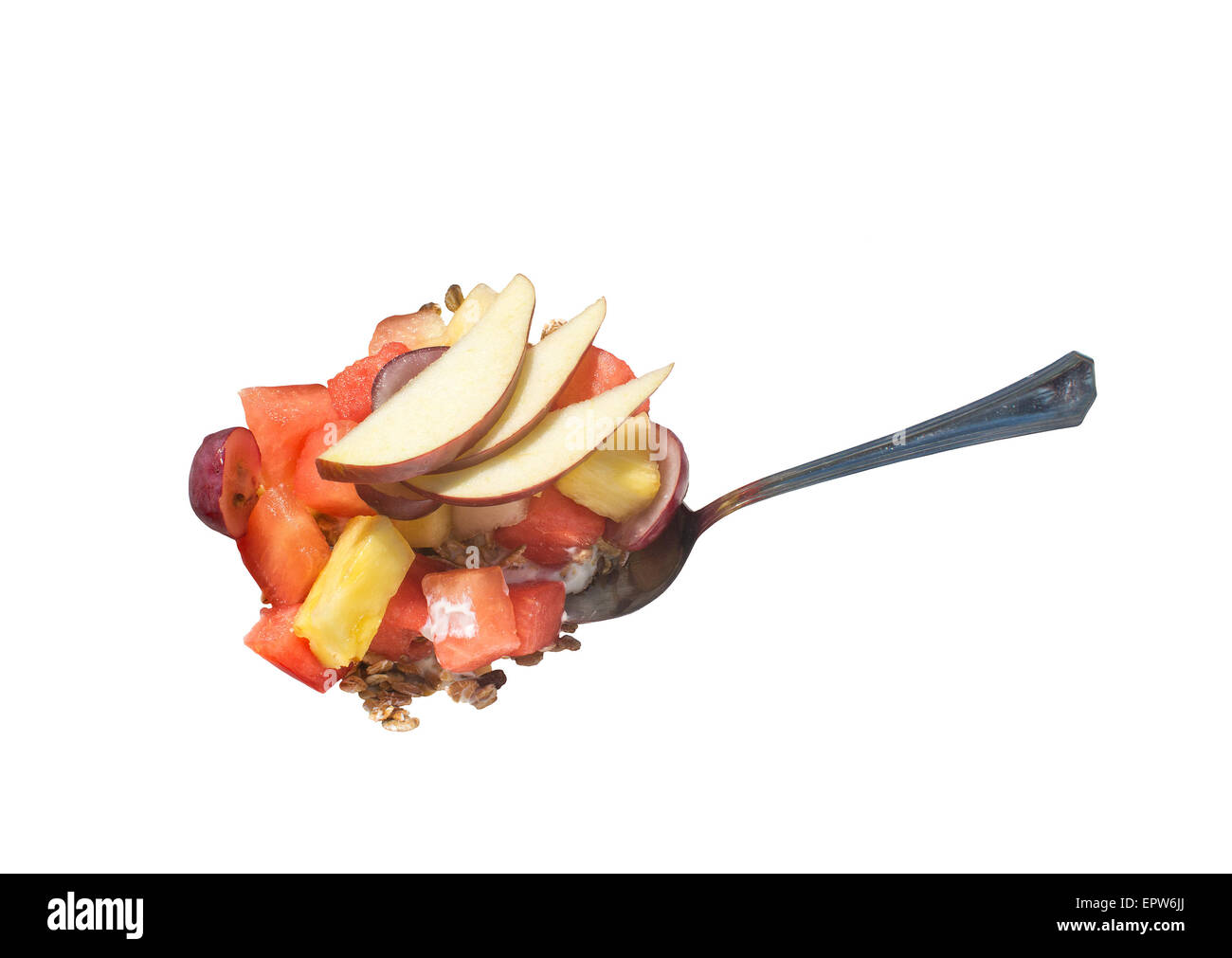 Fruit salad with spoon isolated on white Stock Photo Alamy