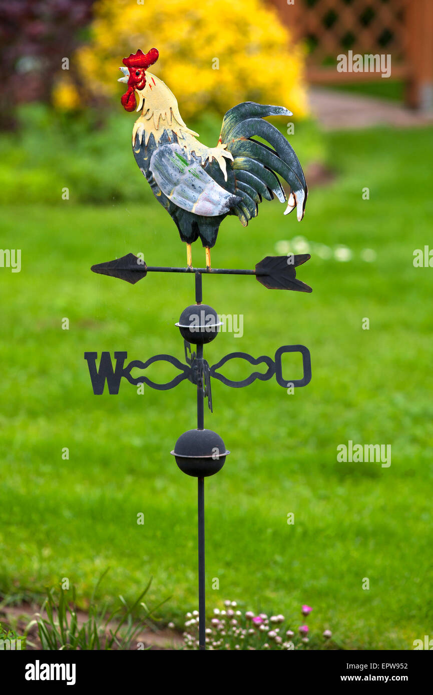 Weathercock made of sheet metal in a garden, Bavaria, Germany Stock Photo