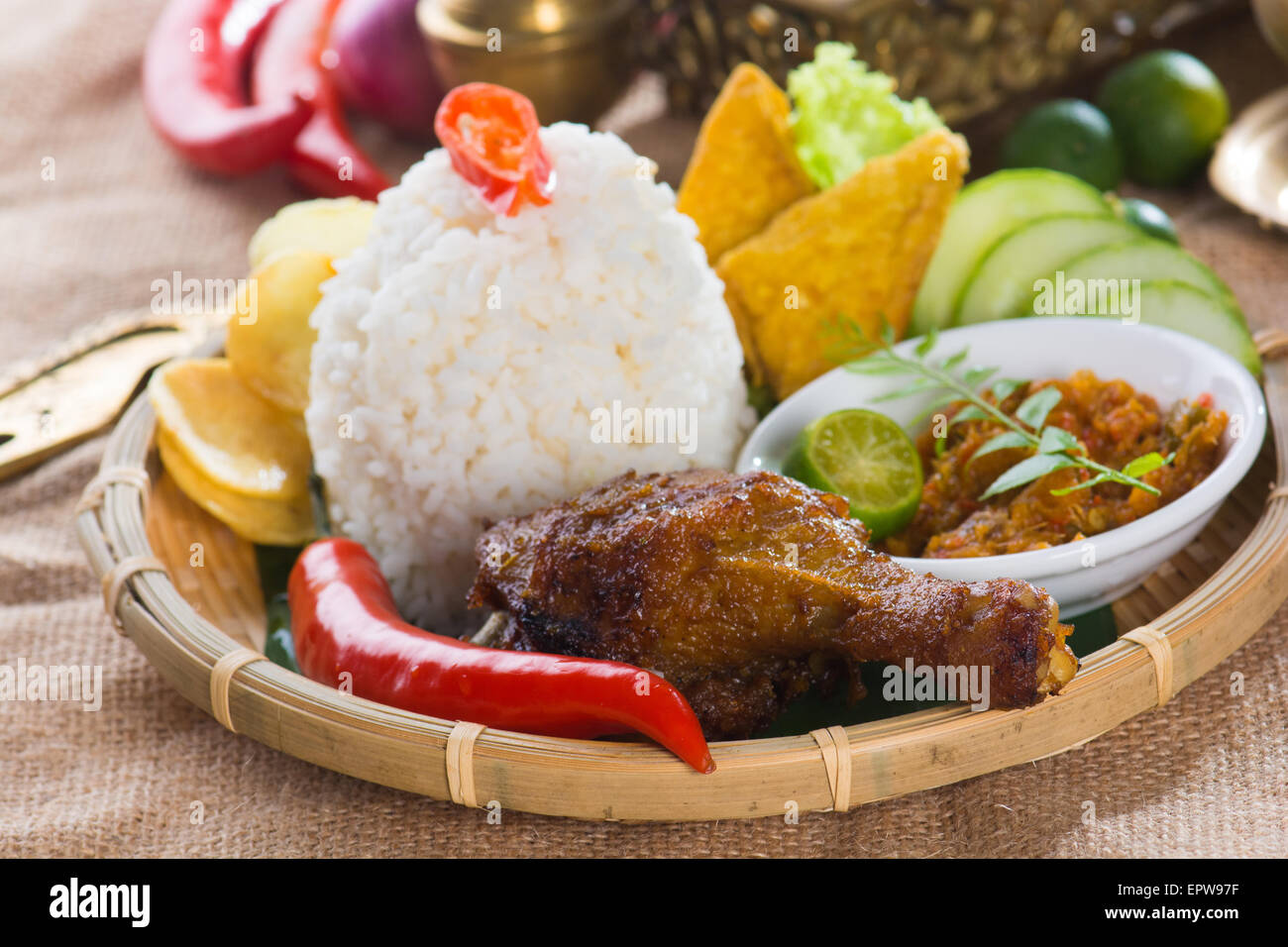 indonesian fried chicken rice Stock Photo - Alamy