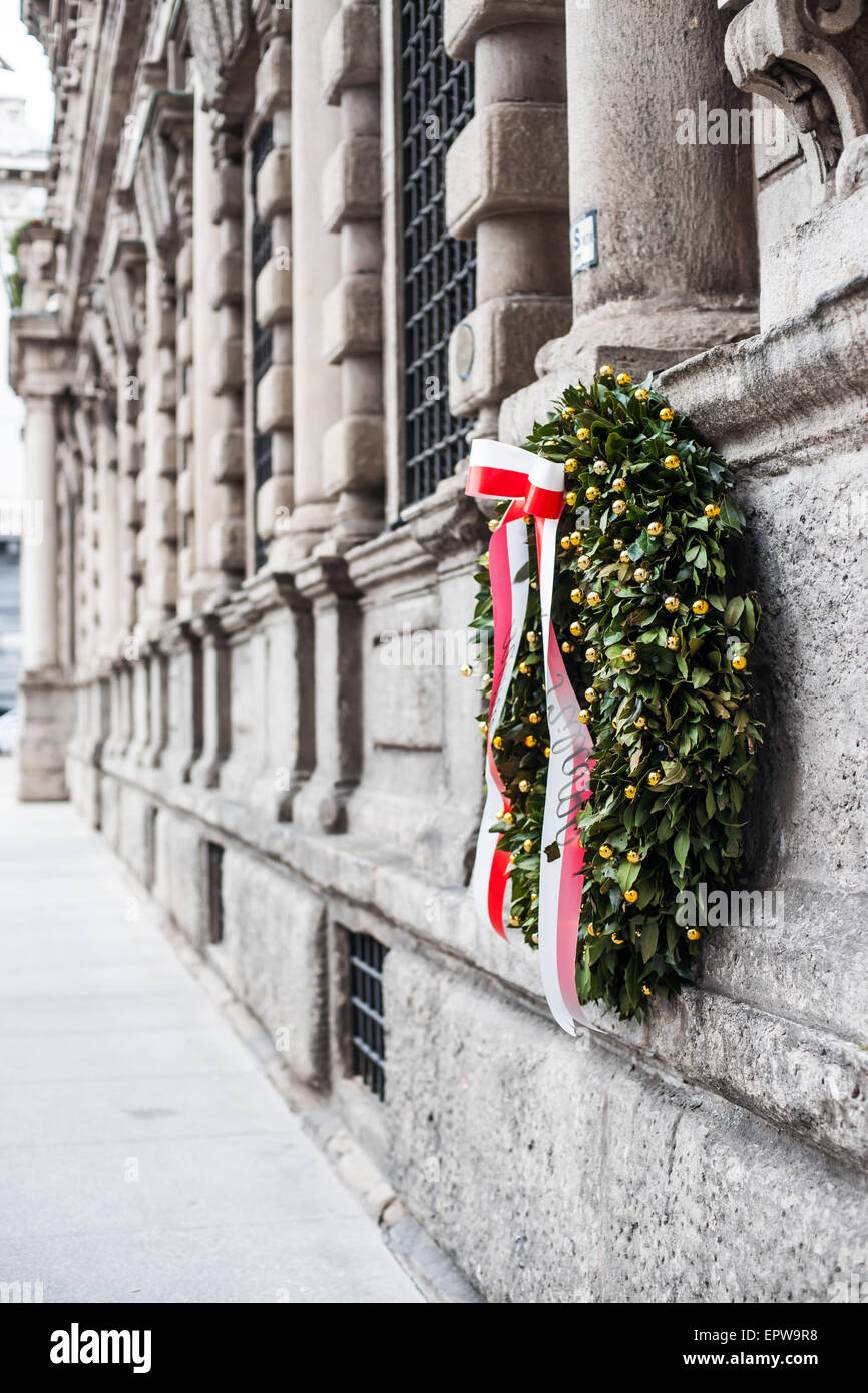 Memorial wreath on institution building in Milan Stock Photo