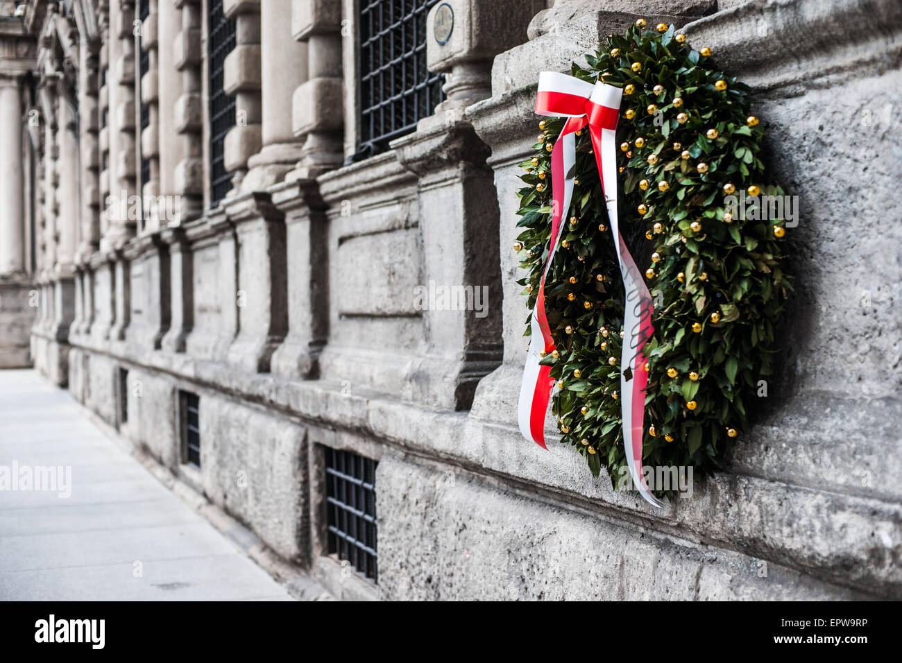 Memorial wreath on institution building in Milan Stock Photo