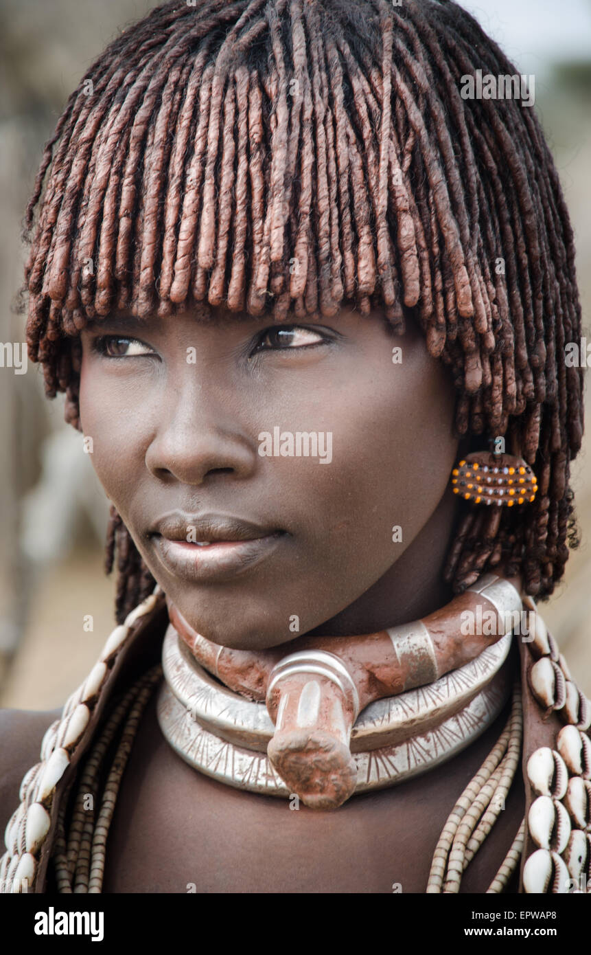 TURMI, ETHIOPIA - 12 AUGUST: portrait of unidentified Hamer tribe woman, Omo valley, 12 august 2014. Hamer woman usualy comb the Stock Photo