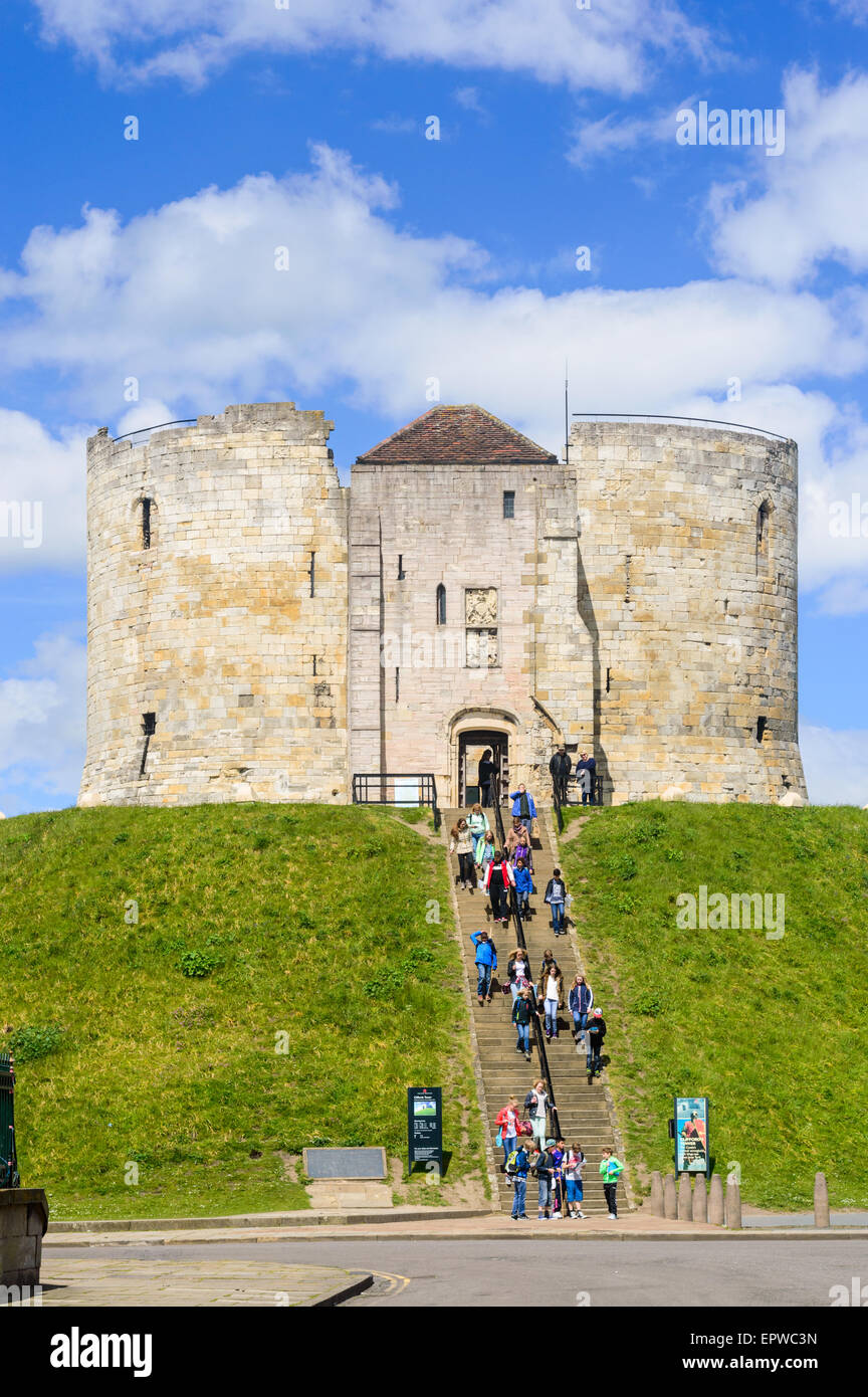 A party of school children descending the steps at Clifford's Tower. York, England Stock Photo