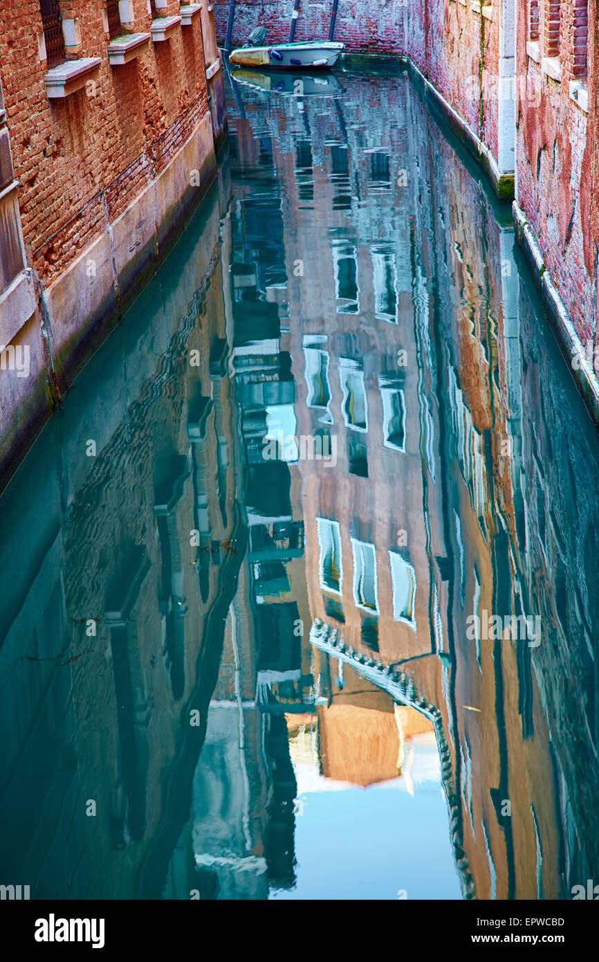 Canals of Venice with reflection in water, Italy Stock Photo - Alamy
