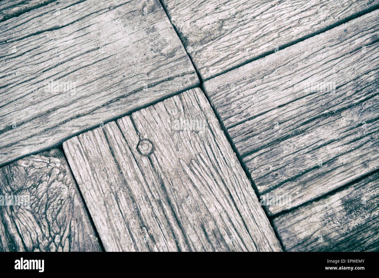 Weathered rough wood plank background textured close-up with joints, grooves, and nails Stock Photo