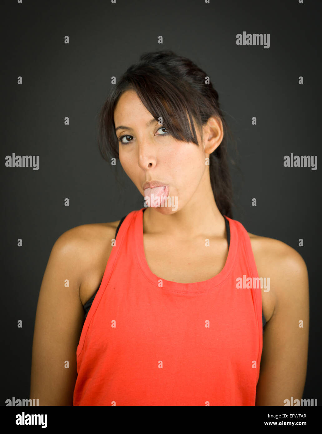 Attractive arabic woman in studio isolated on black Stock Photo