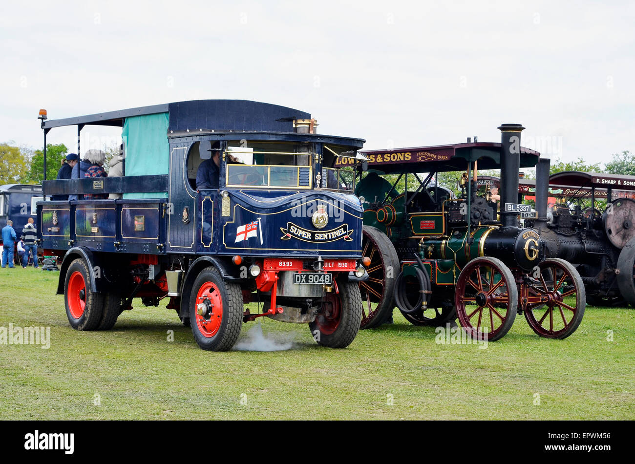A steam traction engine and Sentinel steam lorry side by side at a steam fair. Stock Photo