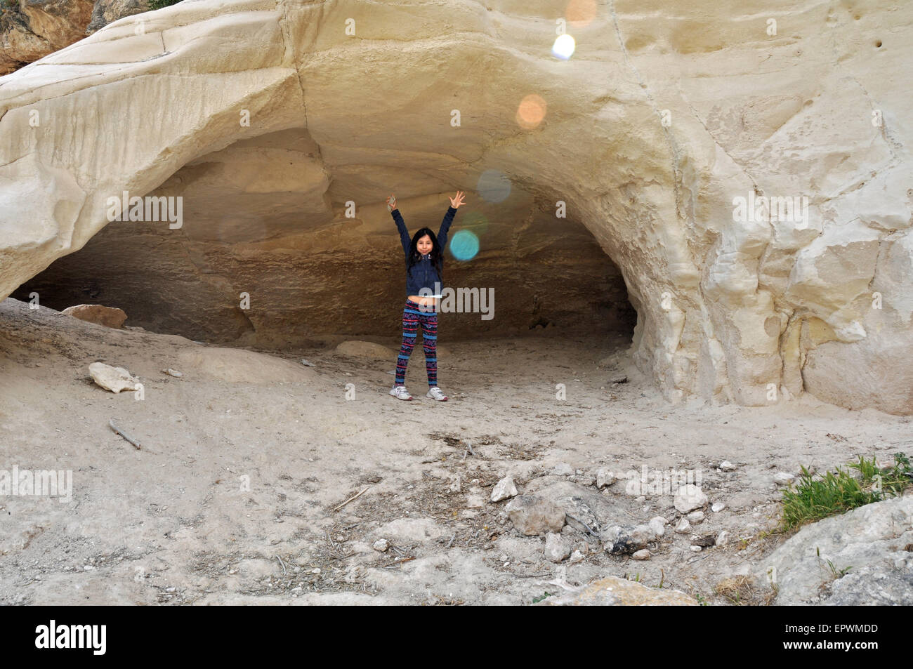 A girl visiting Bar Kokhba caves, Gush Etzion, Israel. Stock Photo
