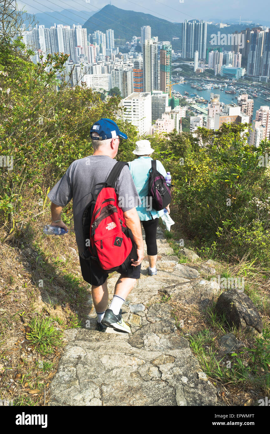 dh Pok Fu lam country park ABERDEEN HONG KONG Tourist hikers walking footpath above Aberdeen hiking tourists holiday hike island Stock Photo