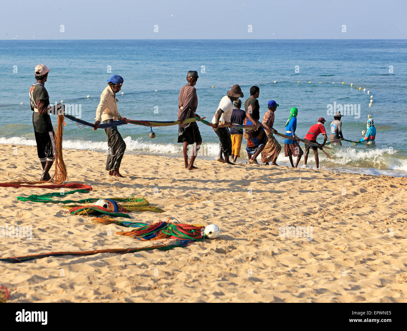 Traditional fishing hauling nets Nilavelli beach , near