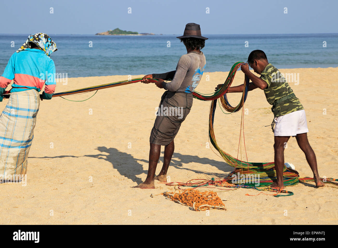 Traditional fishing hauling nets Nilavelli beach , near