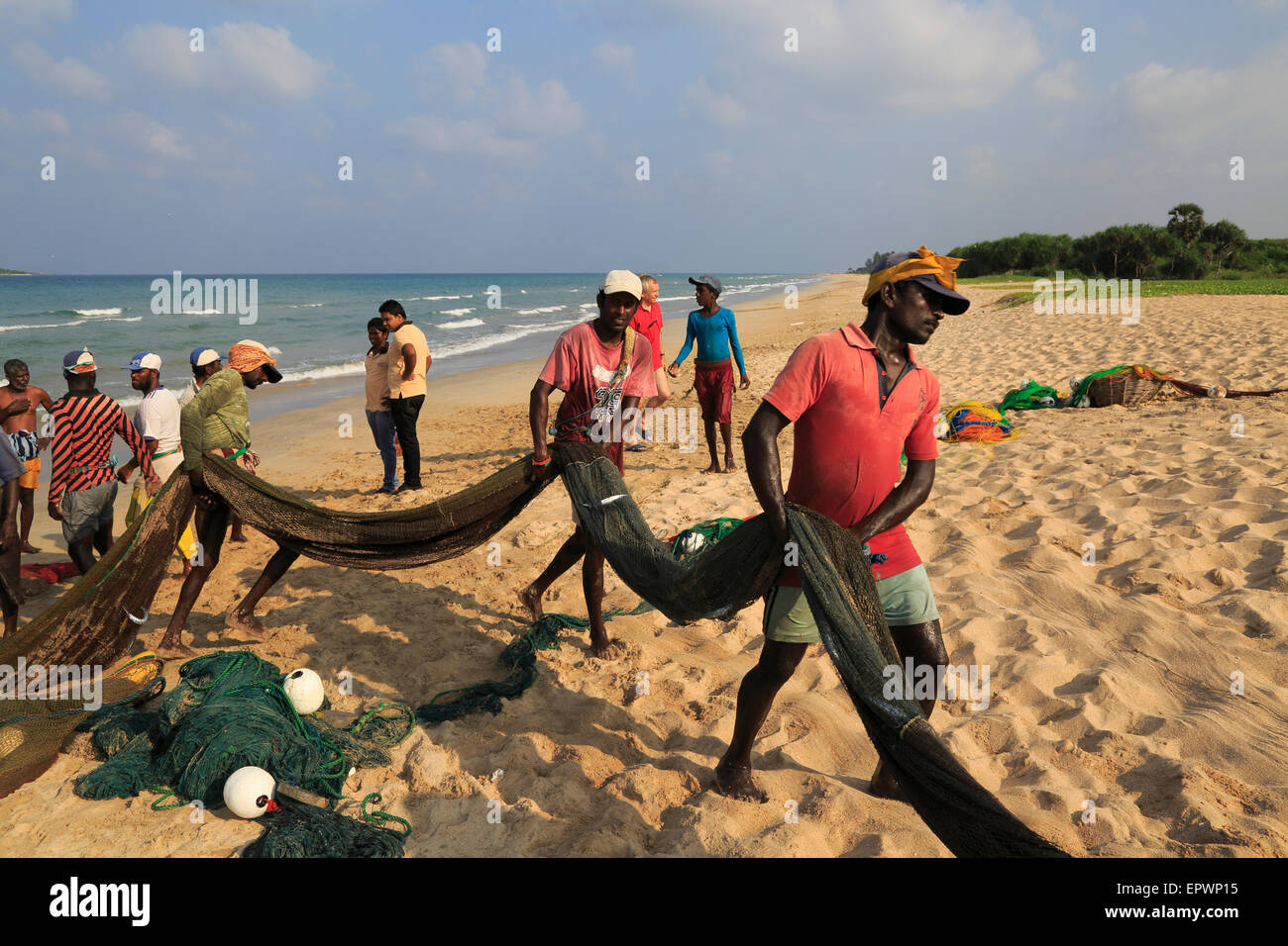 Traditional fishing hauling nets Nilavelli beach , near