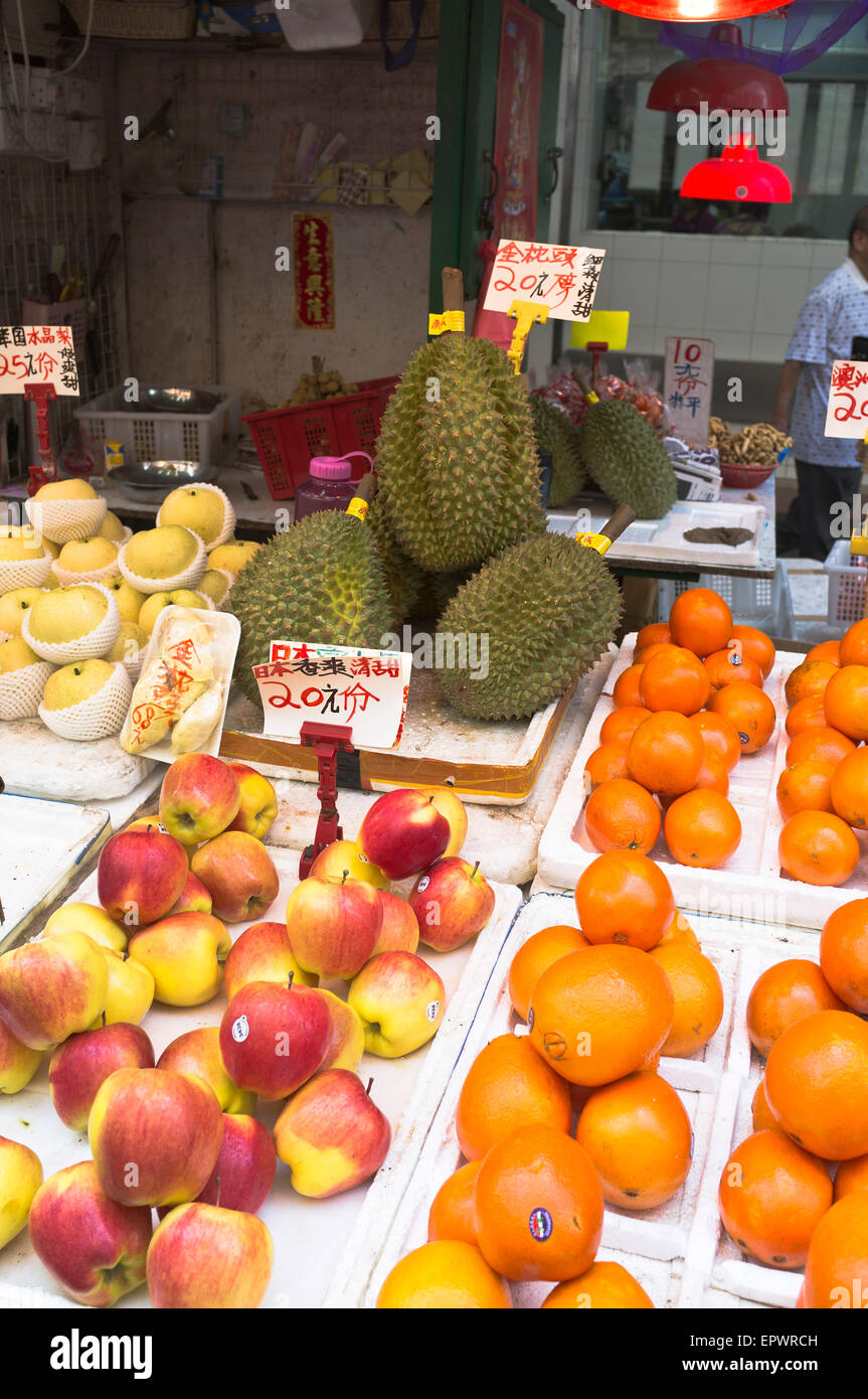 dh  MONG KOK HONG KONG Durian fruit apples and orange fruits stall price tags market Stock Photo