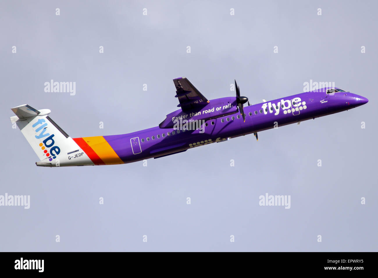 FlyBe DeHavilland Dash-8 climbs away from runway 05L at Manchester airport. Stock Photo