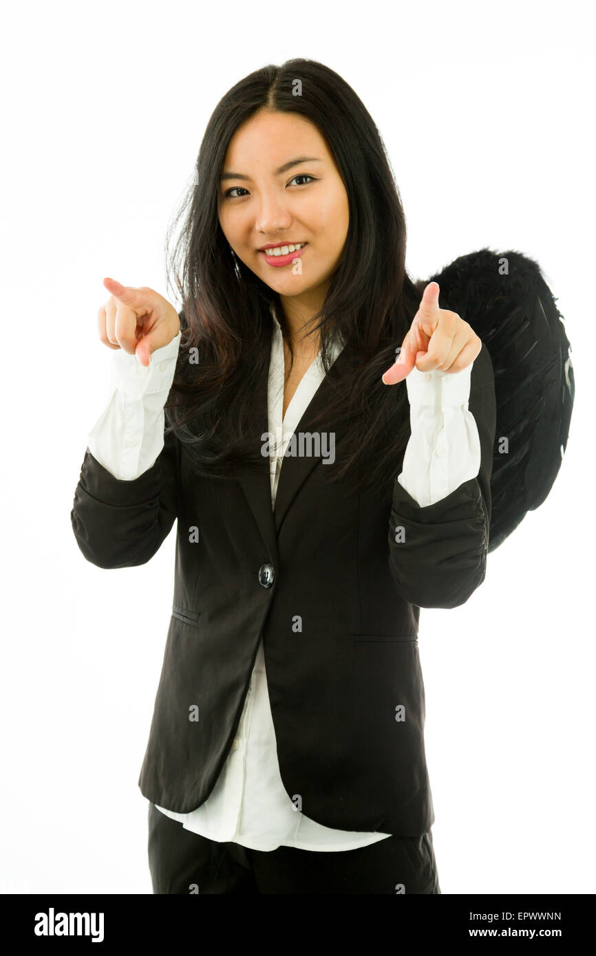 Attractive Asian young adult woman in angels and demon Stock Photo