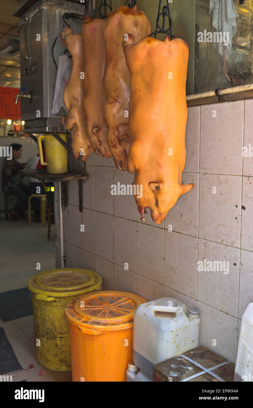 dh Queens Road West SHEUNG WAN HONG KONG Rack of suckling pigs entrance to chinese restaurant far east pig Stock Photo