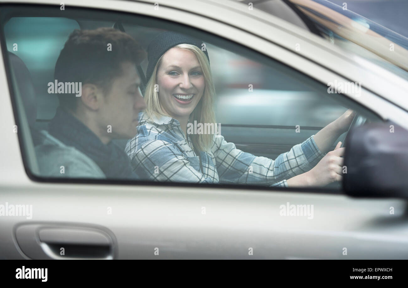 Couple driving car Stock Photo