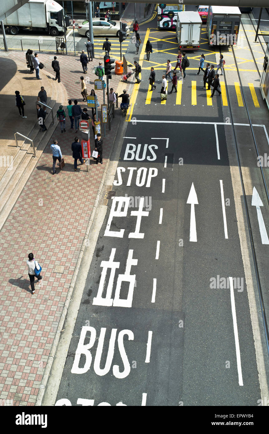 dh Des Voeux Rd CENTRAL HONG KONG Bus stop painted in road English and Chinese calligraphy signs china signage roads Stock Photo