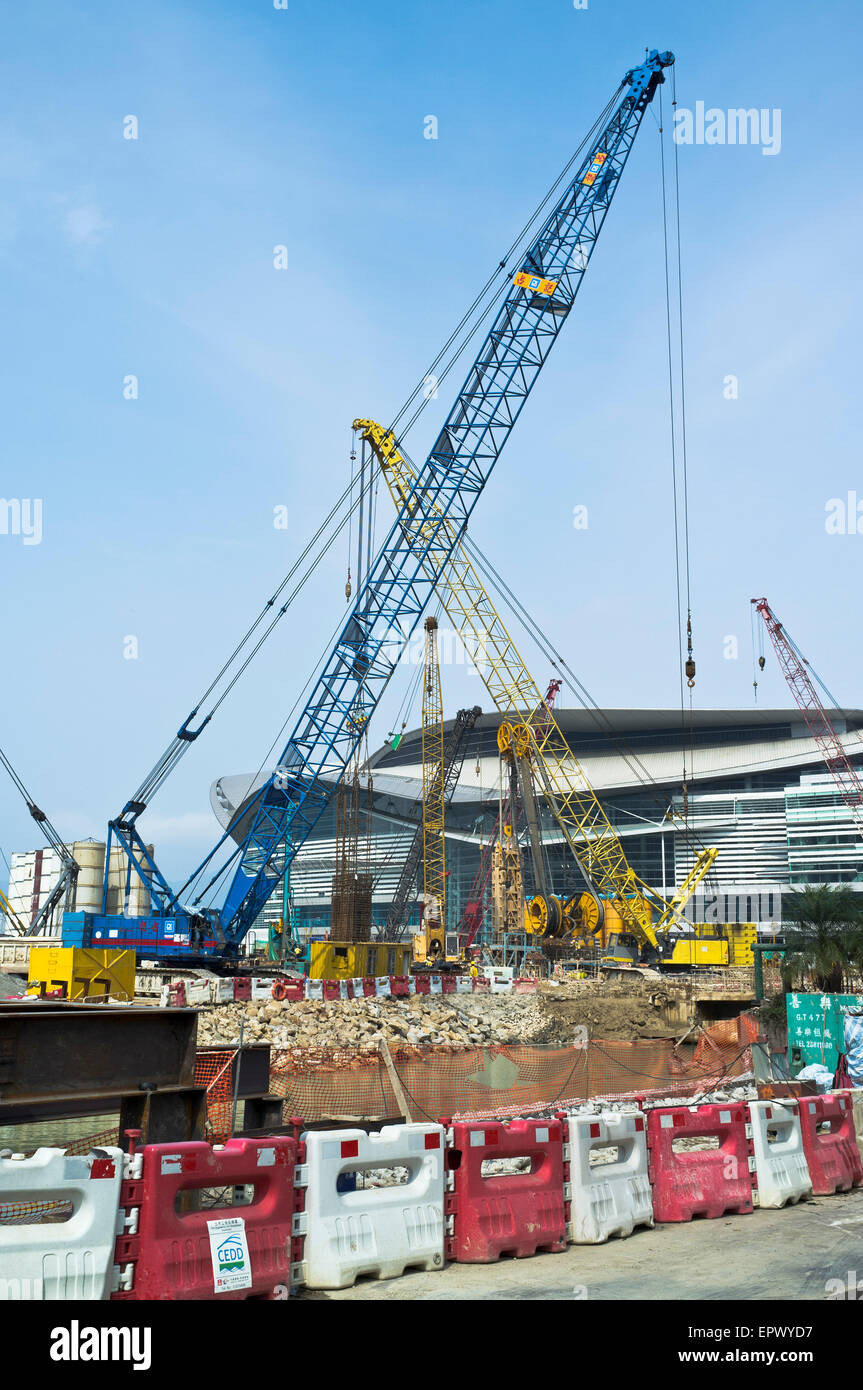 dh Construction WAN CHAI HONG KONG Cranes construction on reclaimed land reclamation Stock Photo