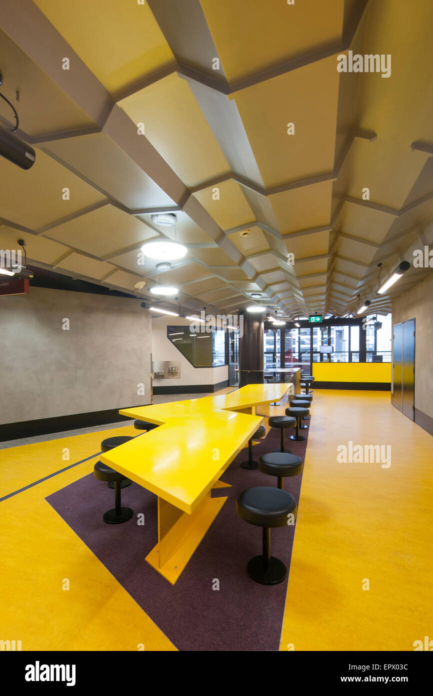 Yellow study area in Swanston Academic building, RMIT, Melbourne, Australia Stock Photo