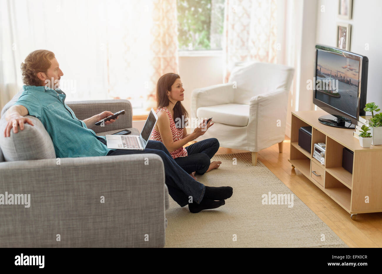 Couple watching tv Stock Photo