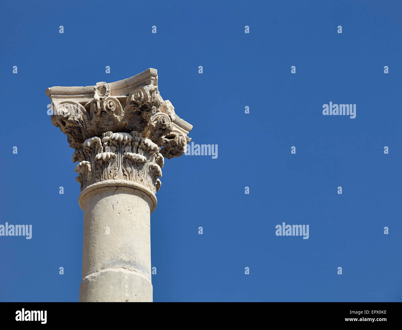 Historic pillar against blue sky at Valleta City Gates, Malta. Stock Photo