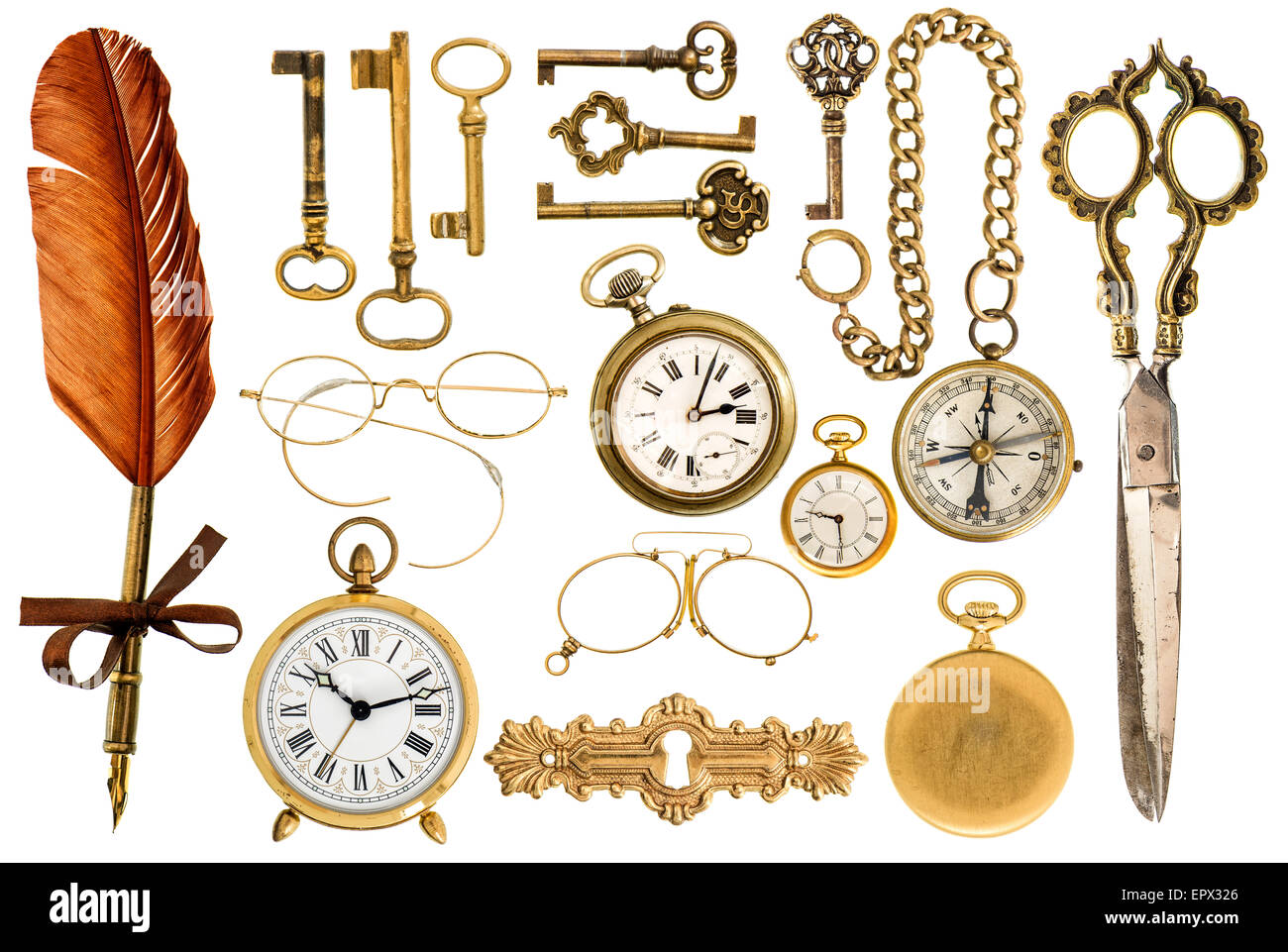 Collection of golden vintage accessories. antique keys, clock, compass, scissors, glasses isolated on white background Stock Photo