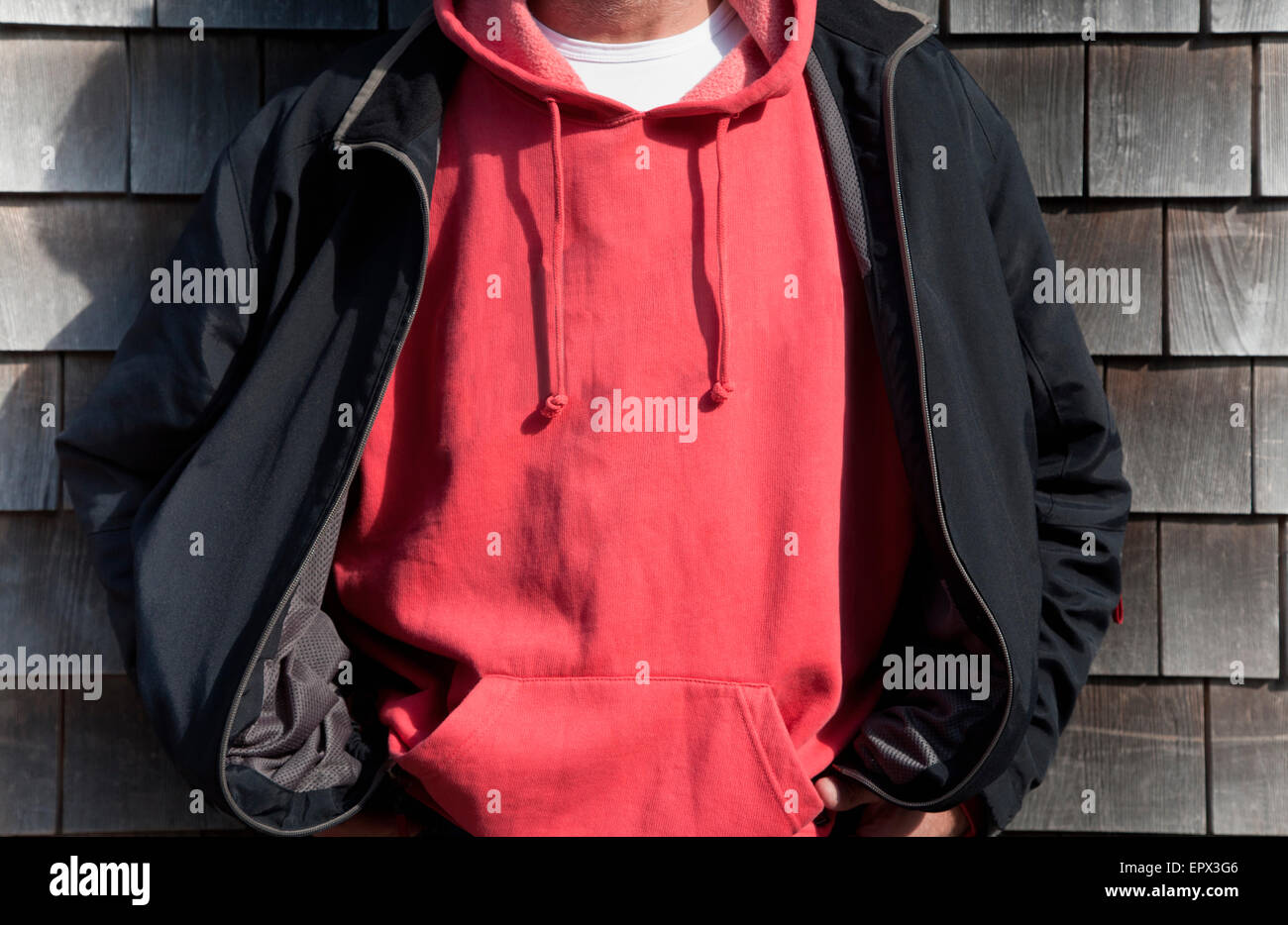 Man wearing red hooded shirt Stock Photo Alamy
