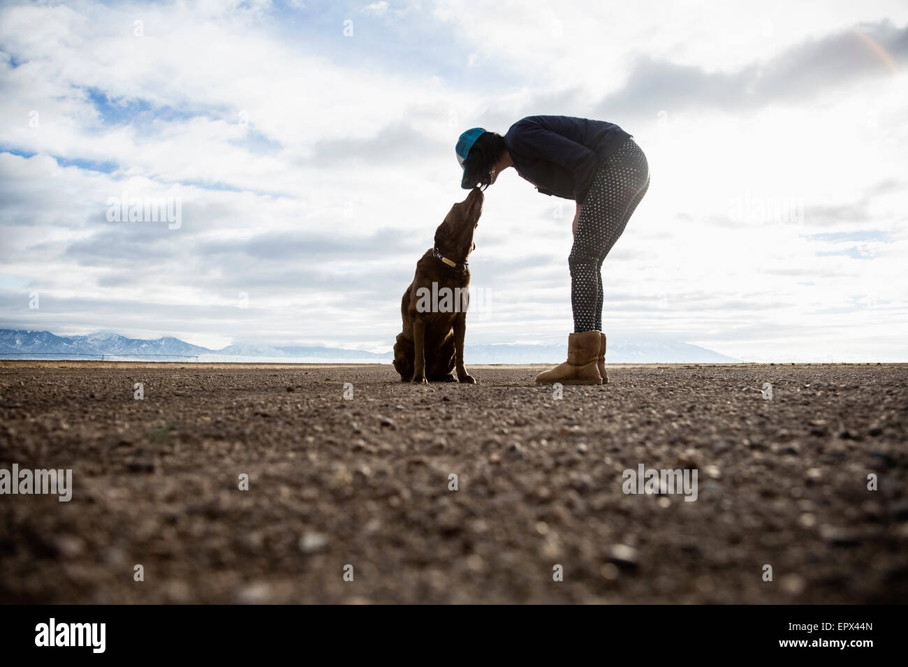 USA, Colorado, Woman with dog outdoors Stock Photo