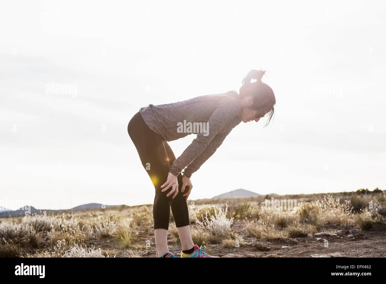 USA, Colorado, Female runner taking a break Stock Photo