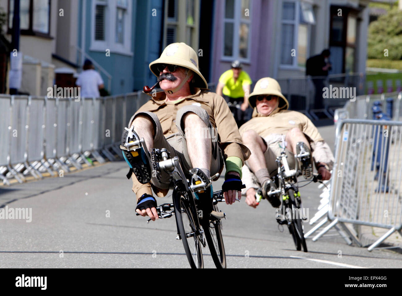 Aberystwyth, UK. 22nd May, 2015. Amatuer cyclists take part in Town vs Gown races ahead of the professional race in the Pearl Izumi Tour Series in Aberystwyth, UK. Racers on recline bikes dressed in jungle fatigues. Credit:  Jon Freeman/Alamy Live News Stock Photo