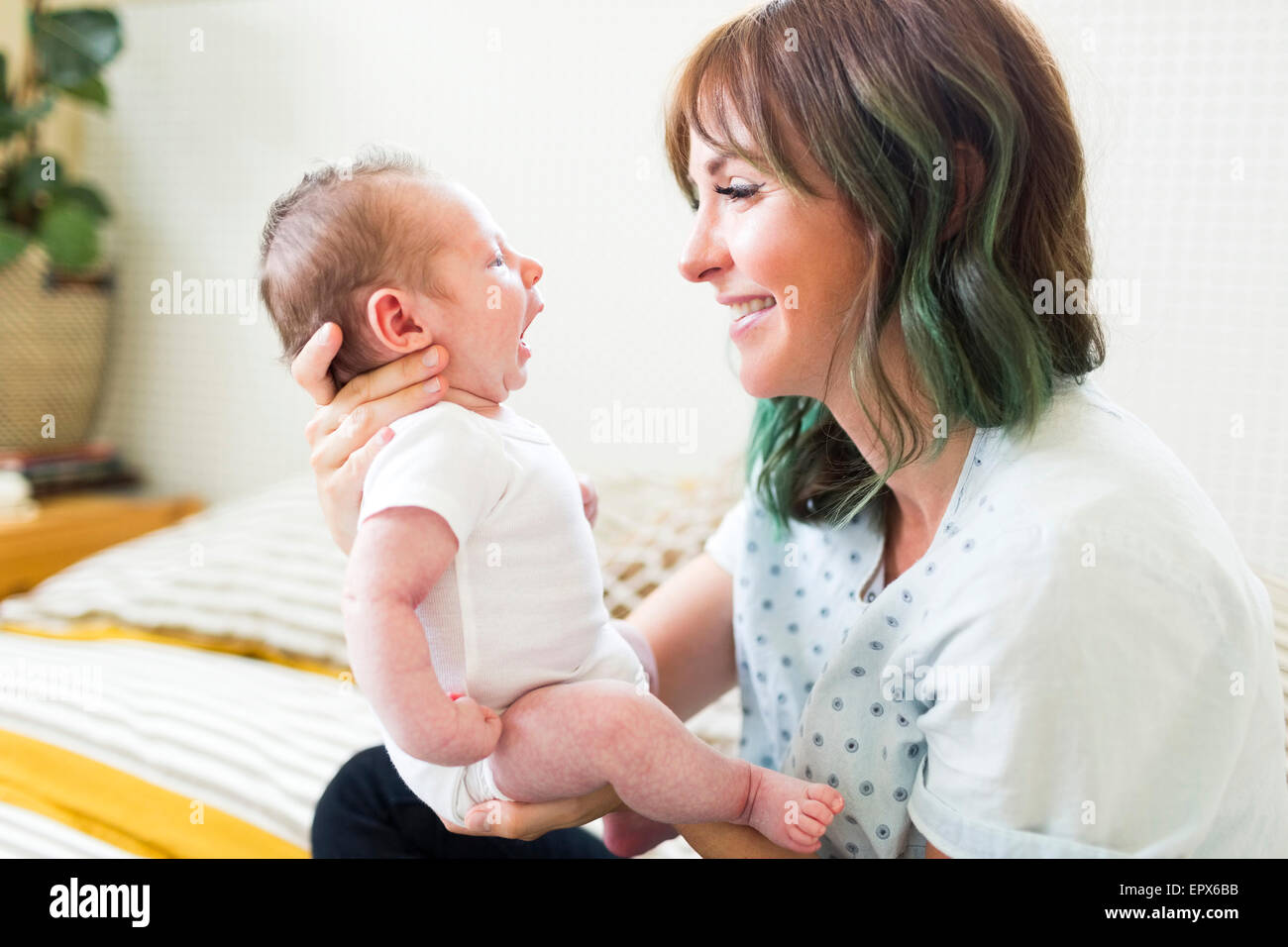 Newborn baby mother holding hi-res stock photography and images - Alamy