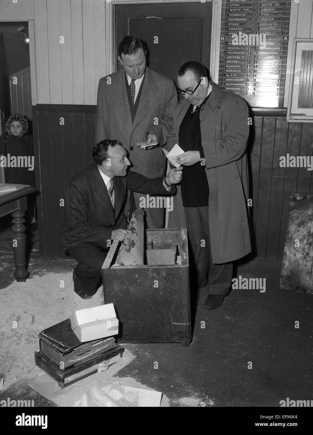 Harry Zussman, Chairman Leyton Orient Football Club, examines robbery damage, 7th March 1954. Stock Photo