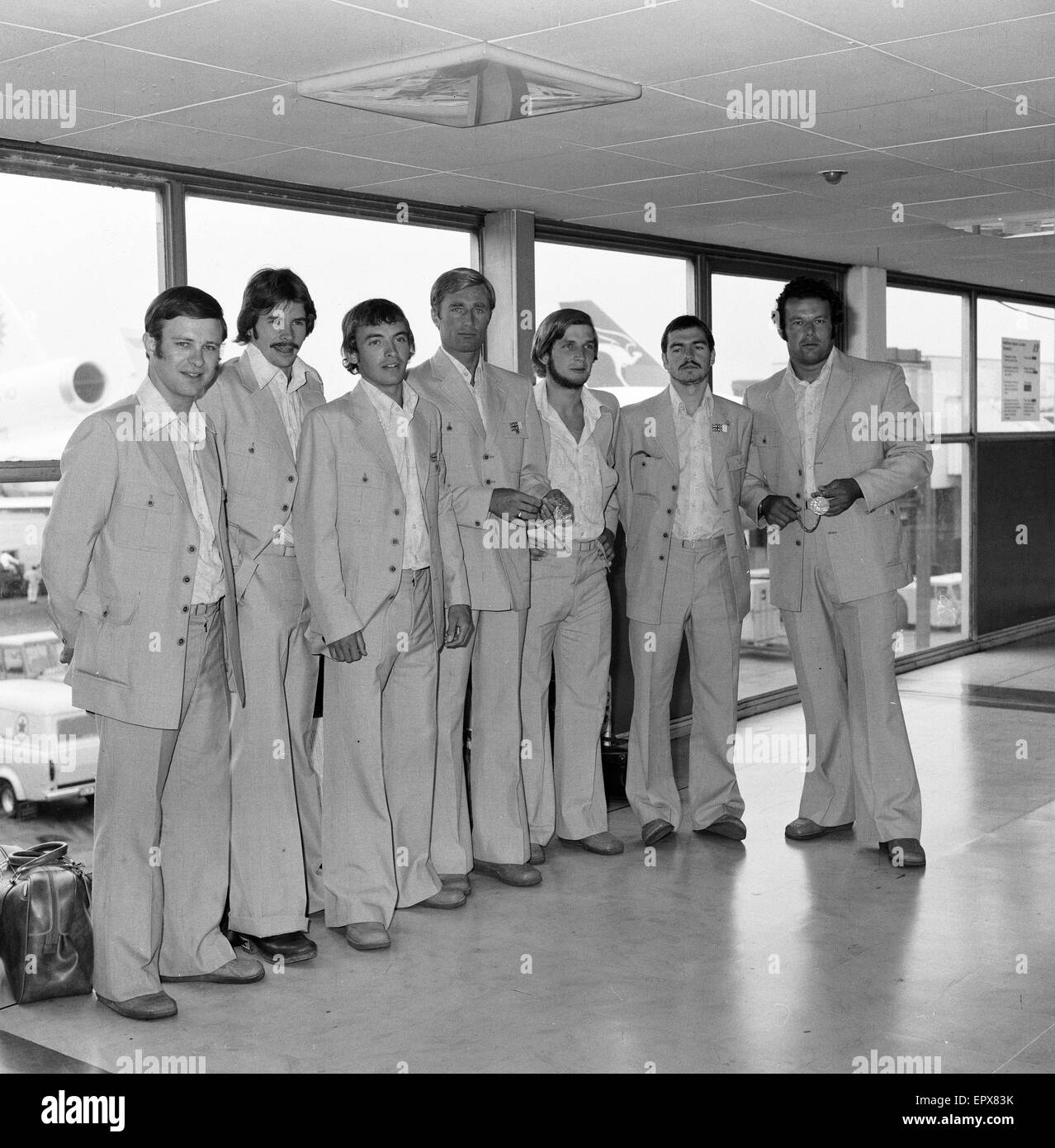 1976 British Olympic Team Returns Home, London Heathrow Airport, 3rd August 1976. Amongst the medal winners was David Wilkie, 2nd Left, Olympic Champion, 200 metre breaststroke. Stock Photo