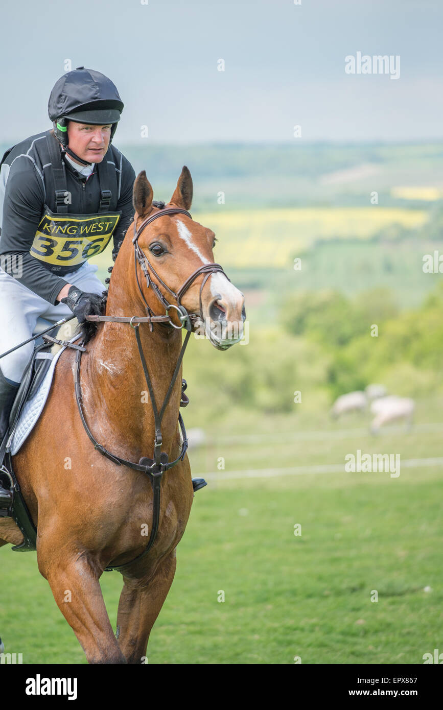 Rockingham, UK. 22nd May, 2015. Horse and rider at the cross country event of the international horse trials on friday 21 may, 2015 in the grounds of the norman castle overlooking the Welland valley at the village of Rockingham, near Corby, England. Credit:  miscellany/Alamy Live News Stock Photo