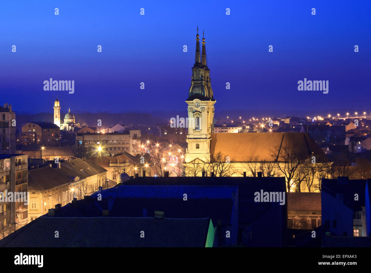 Two churches in Pancevo at dusk Stock Photo