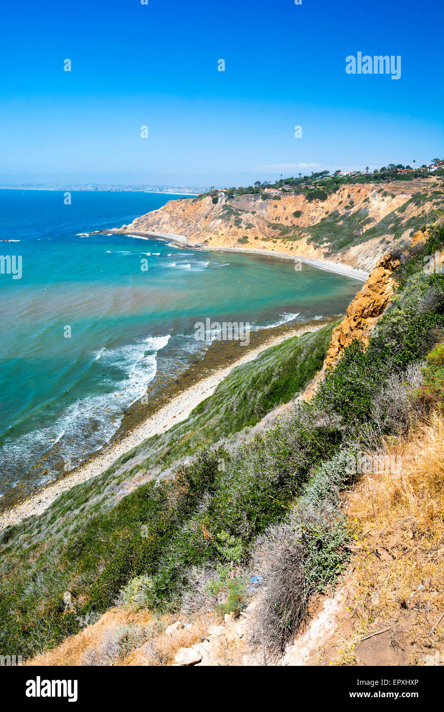 A beautiful ocean image along the cliffs in Palos Verdes California shows a remote cove and bright, sunny day. Stock Photo