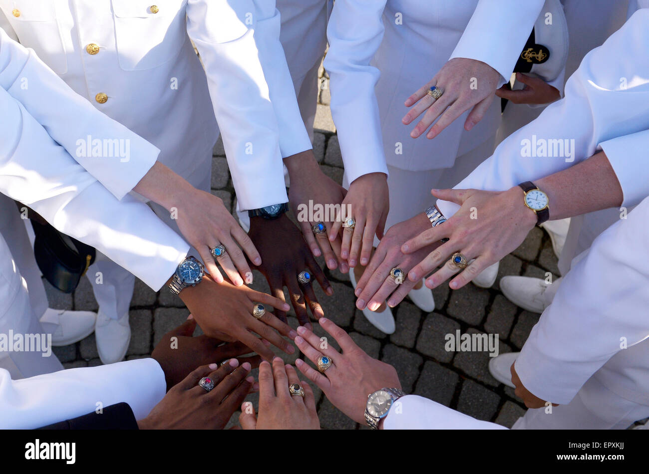 Annapolis, USA. 22nd May, 2015. Graduates show their class rings before  their graduation ceremony at the U.S. Naval Academy(USNA) in Annapolis,  Maryland, the United States, May 22, 2015. More than 1000 students