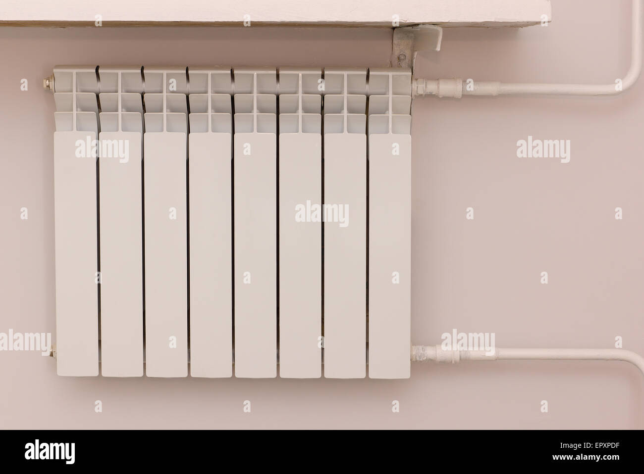 new radiator with hot water for room heating Stock Photo - Alamy