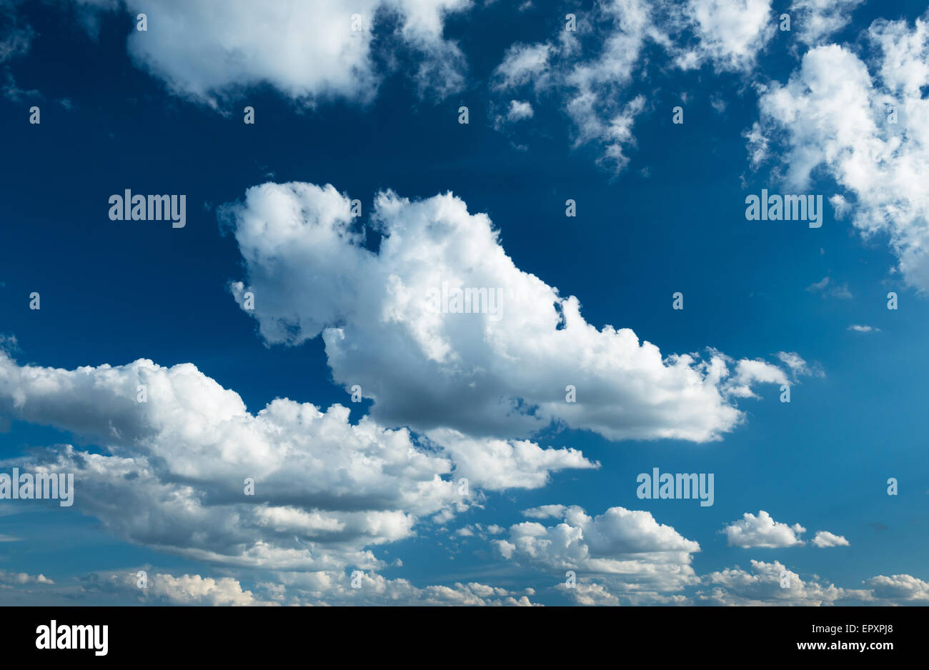 Blue sky background with soft white clouds Stock Photo - Alamy