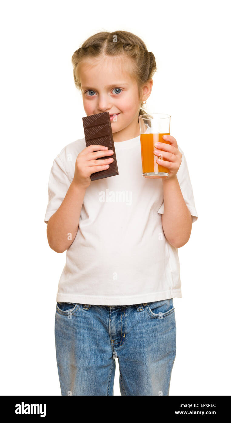 little girl with a glass of juice and chocolate Stock Photo Alamy