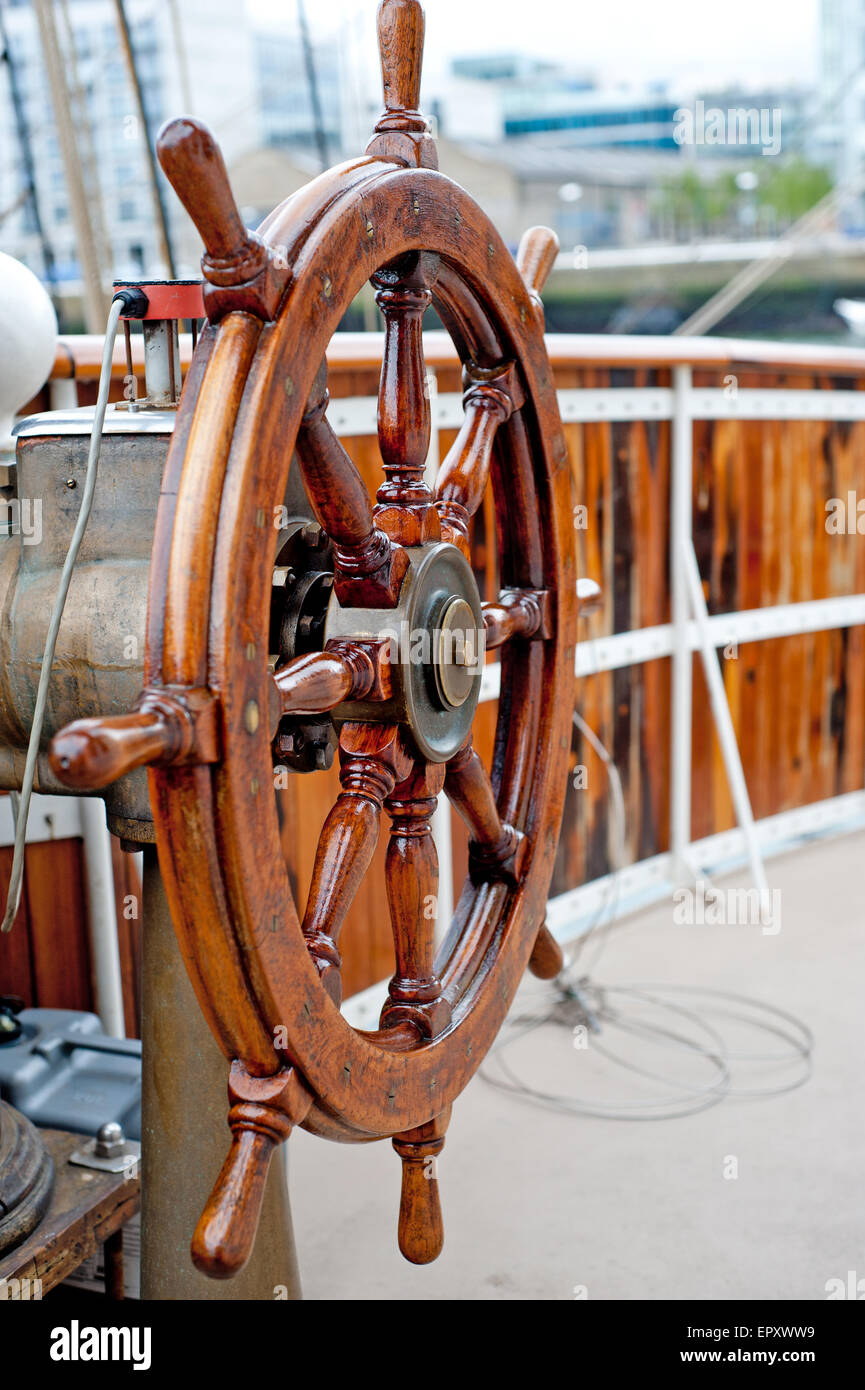 Wooden Ship wheel close up on a sailboat Stock Photo Alamy