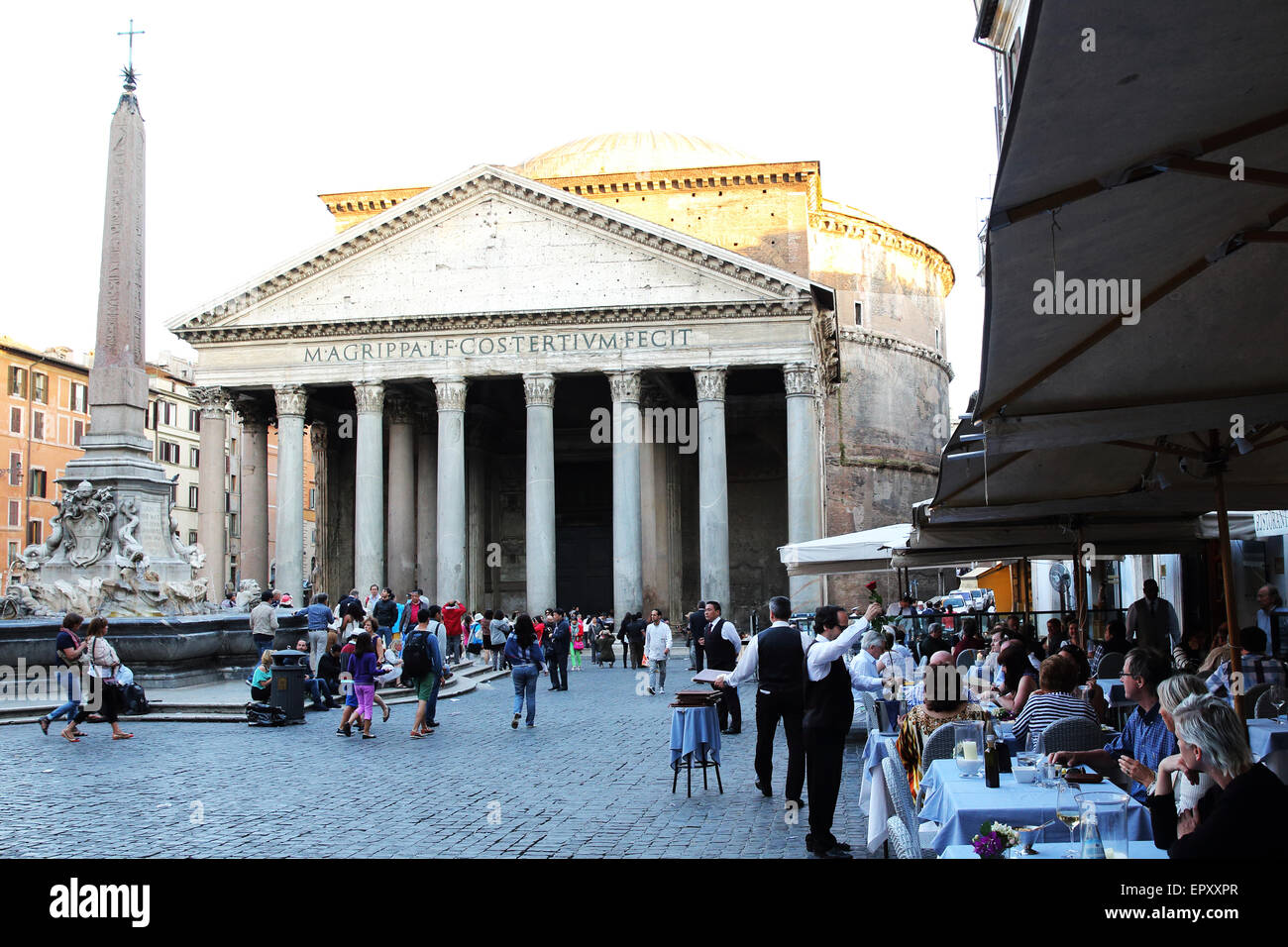 Piazza della Rotunda with the Pantheon and people enjoying the view from an outdoor restaurant in Rome. Stock Photo
