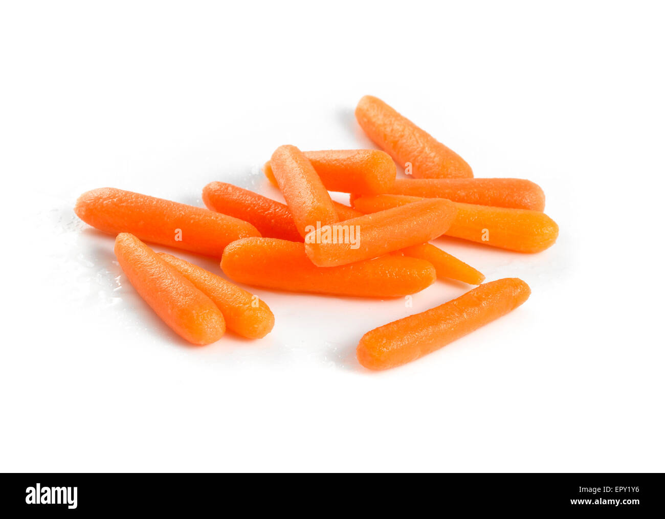 baby carrots isolated on a white background Stock Photo Alamy