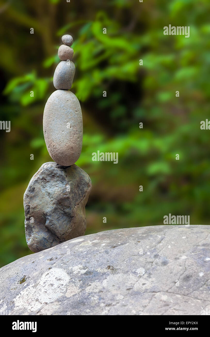 Art, discipline or hobby of balancing stones or stacking rocks to make rock  or stone cairns. Balanced / stacked on beach shoreline with sea behind  Stock Photo - Alamy