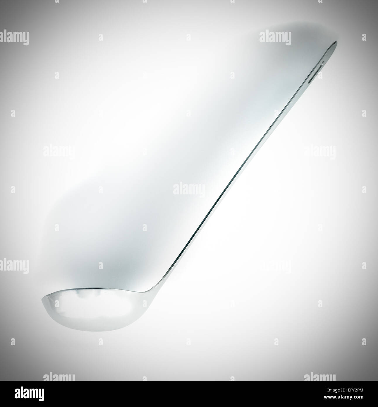 profile view of a laddle isolated on a white background Stock Photo