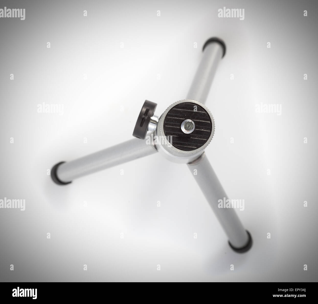 camera tripod isolated on a white background Stock Photo - Alamy