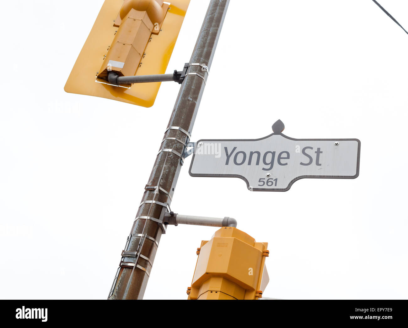 Low angle view of traffic light on white background, Yonge Street