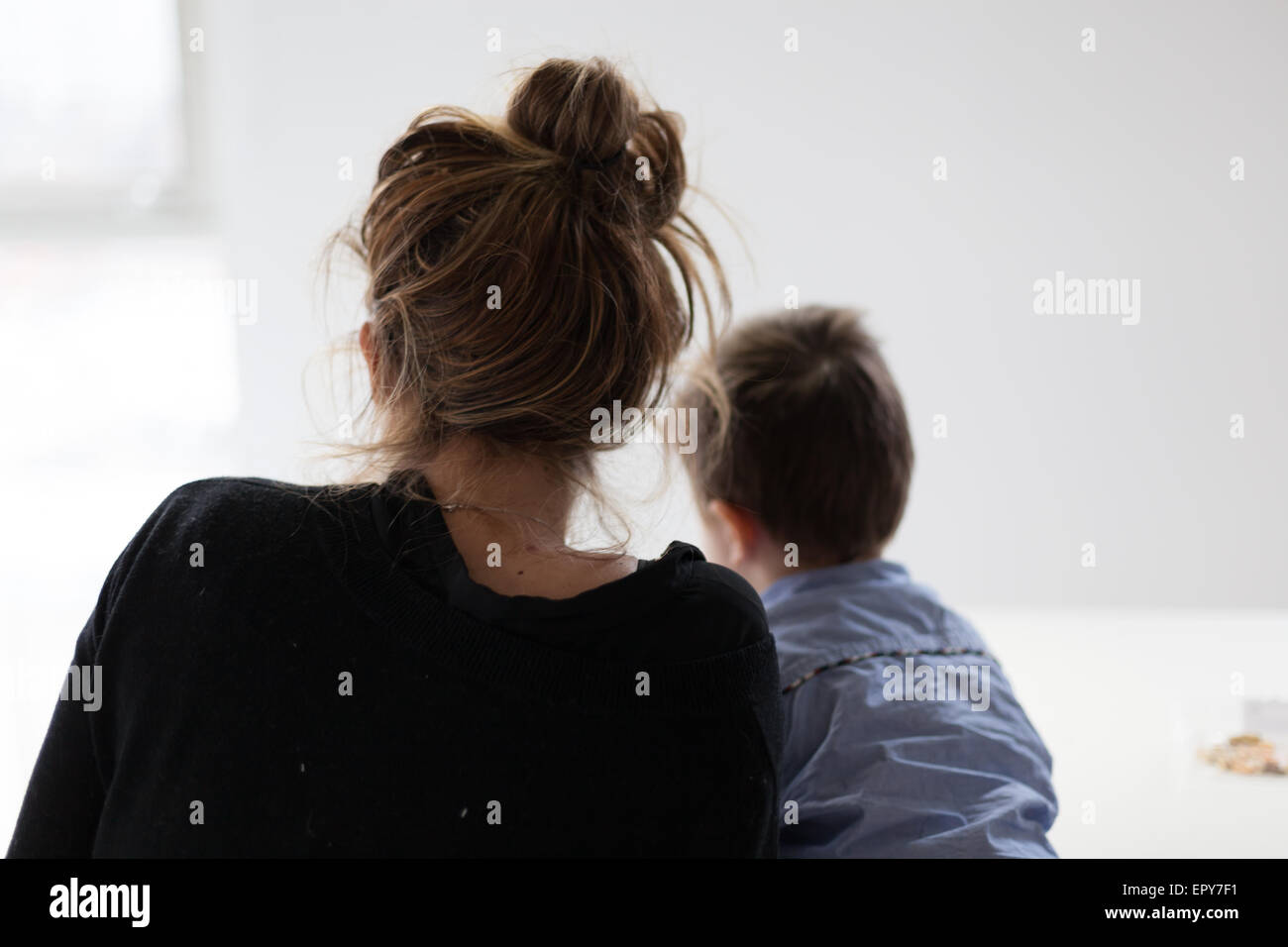 Rear view of mother and son relaxingcolor image, canon 5DmkII Stock ...