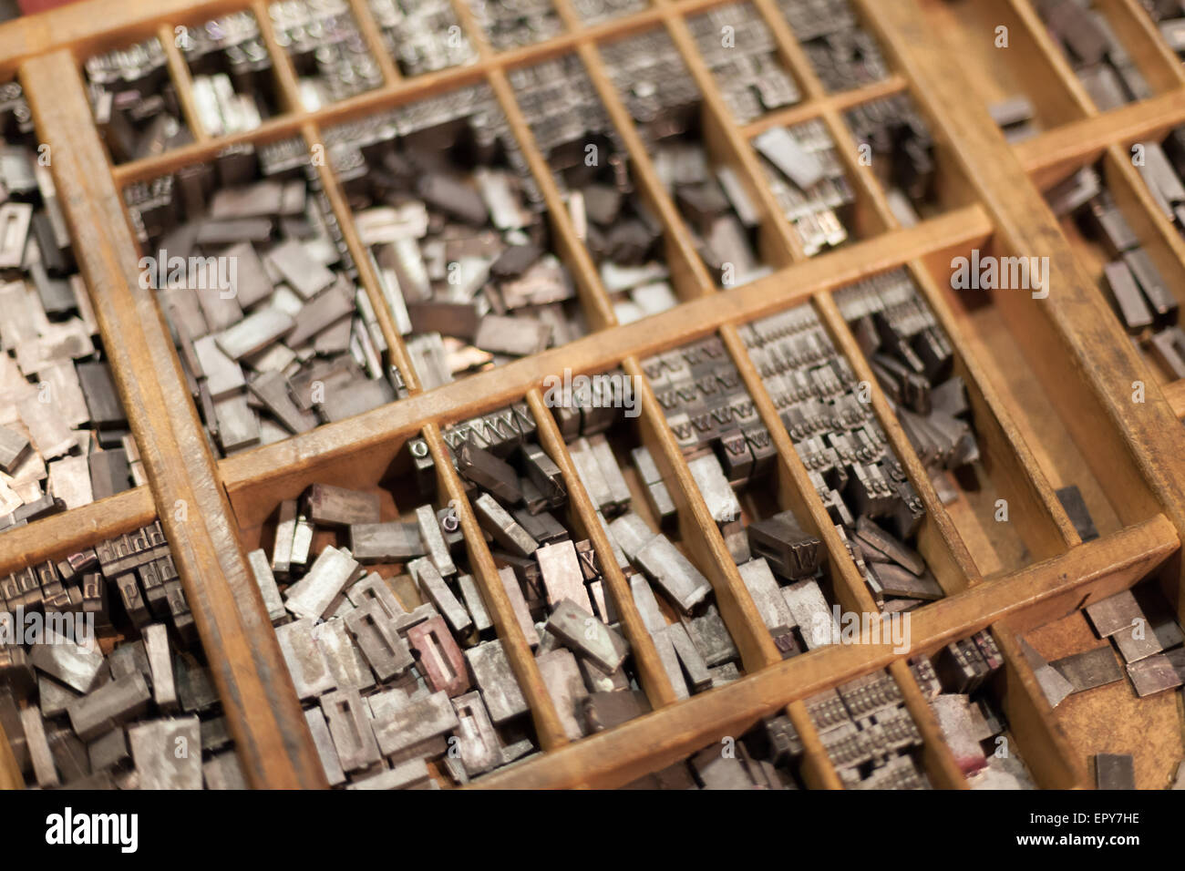 Close-up of metal letterpress letters in printing machinecolor image ...